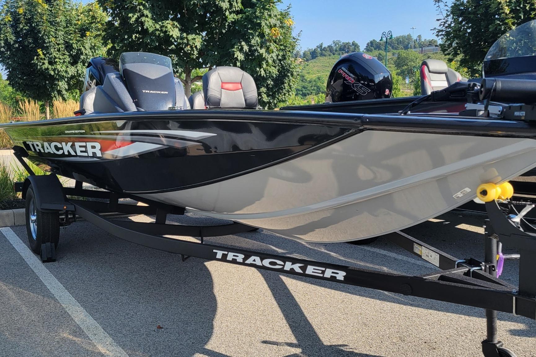 Tracker Pro Team 175 Crappie Edition 2026 Tracker Pro Team 175 Crappie Edition boat on trailer, parked outdoors.