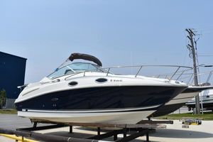 Sea Ray 240 Sundancer 2008 Sea Ray 240 Sundancer boat on display, featuring sleek design and modern amenities.