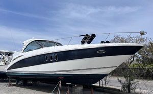 Cruisers Yachts 390 Sports Coupe 2009 Cruisers Yachts 390 Sports Coupe on dry dock, sleek design, blue and white hull.