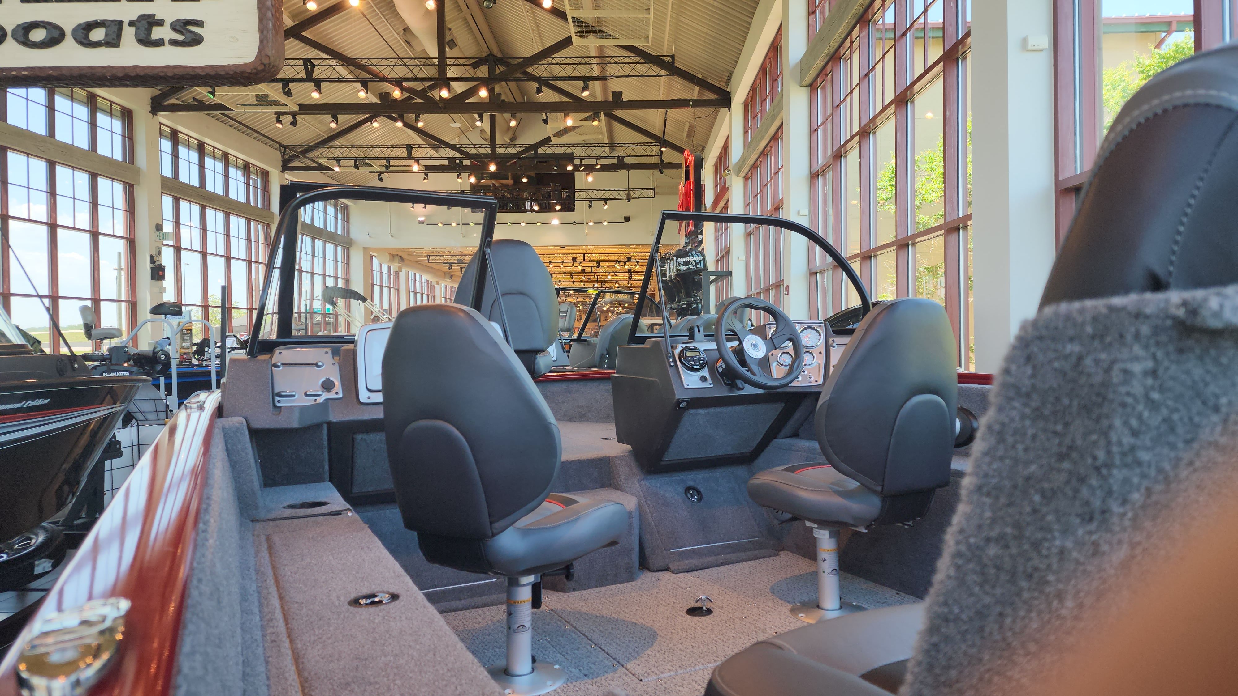 Tracker Off Road PGV 175 C0mb0 Interior of 2023 Tracker Off Road PGV 175 Combo boat in showroom setting.