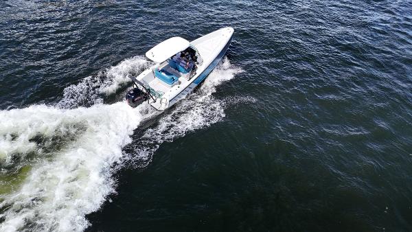 Saxdor SX200 2022 Saxdor SX200 boat cruising on open water, aerial view.