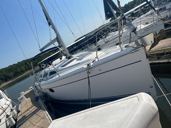 Hunter 36 2009 Hunter 36 sailboat docked at a marina.
