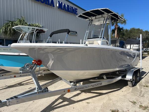 Key West 203 FS 2025 Key West 203 FS boat on trailer outside marine store.
