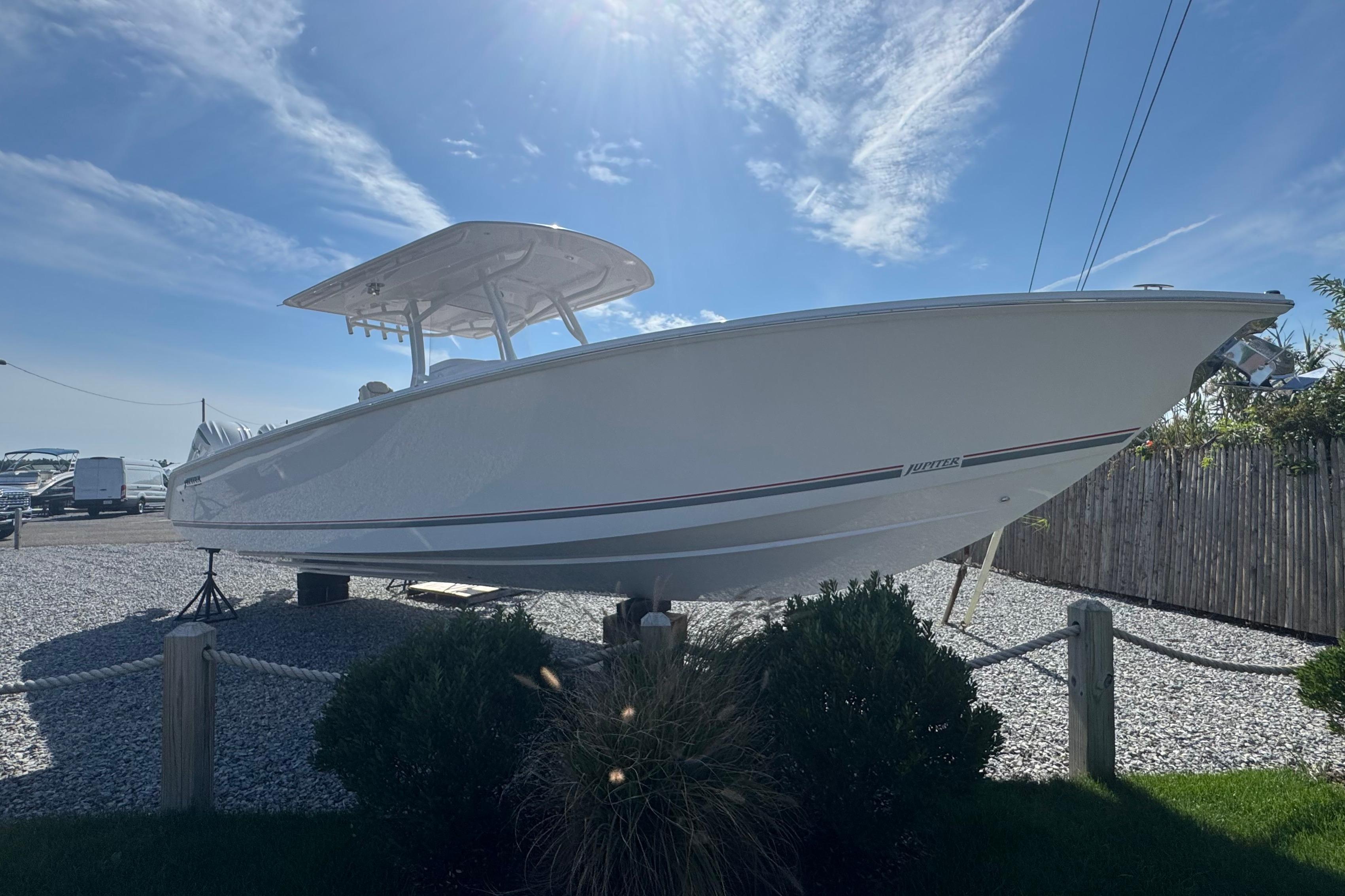 Jupiter 34 HFS 2026 Jupiter 34 boat displayed outdoors under a clear blue sky.
