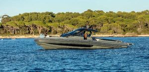 SACS Strider 18 SACS Strider 18 boat cruising on water, 2016 model, with scenic forest backdrop.