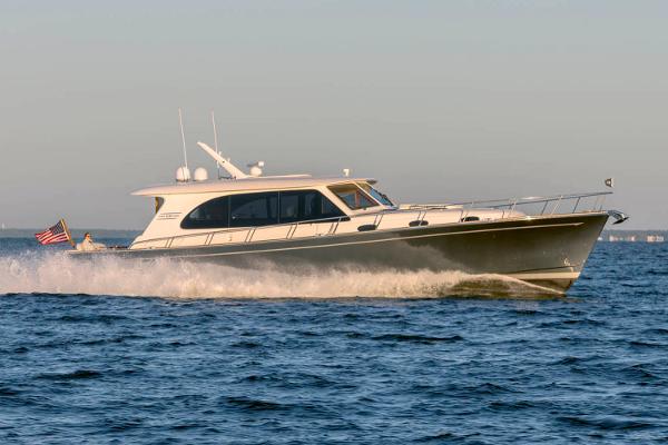 Grand Banks Eastbay 60 2026 Grand Banks Eastbay 60 yacht cruising on open water.