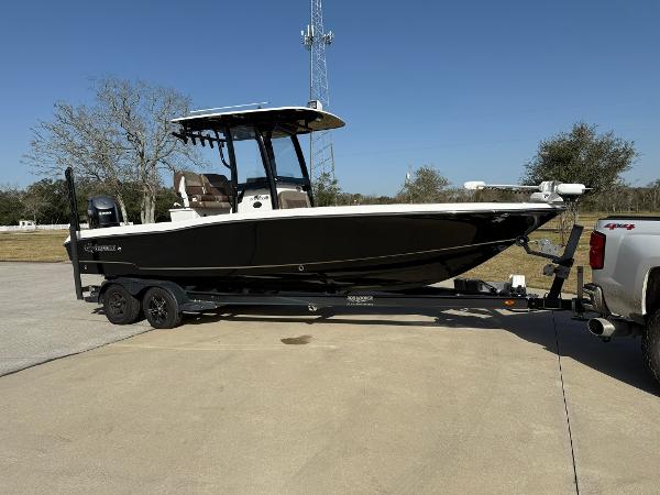 Crevalle 26 Bay 2020 Crevalle 26 Bay boat on trailer, parked outdoors under clear sky.