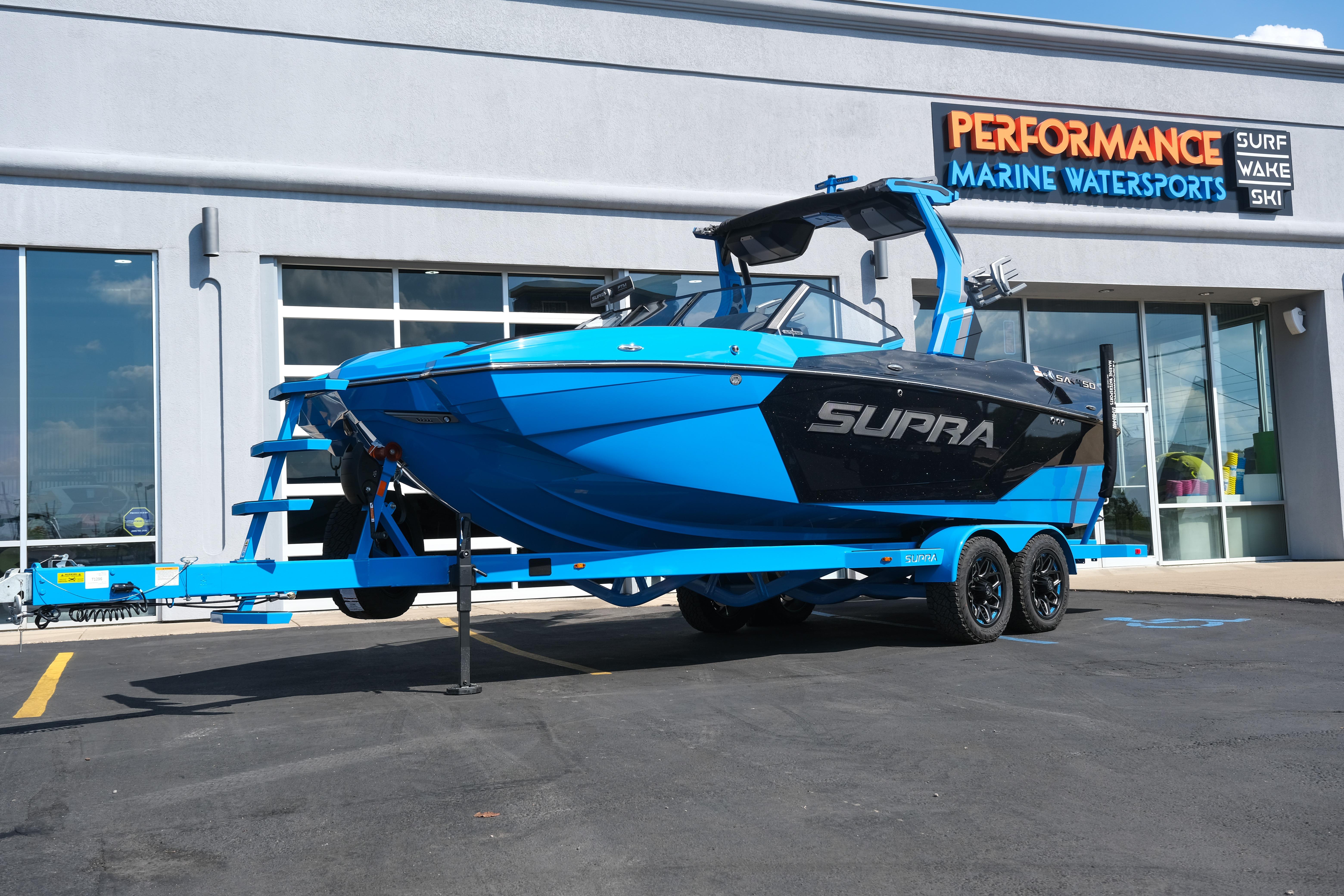Supra SA450 2026 Supra SA450 boat in blue on trailer at Performance Marine Watersports.