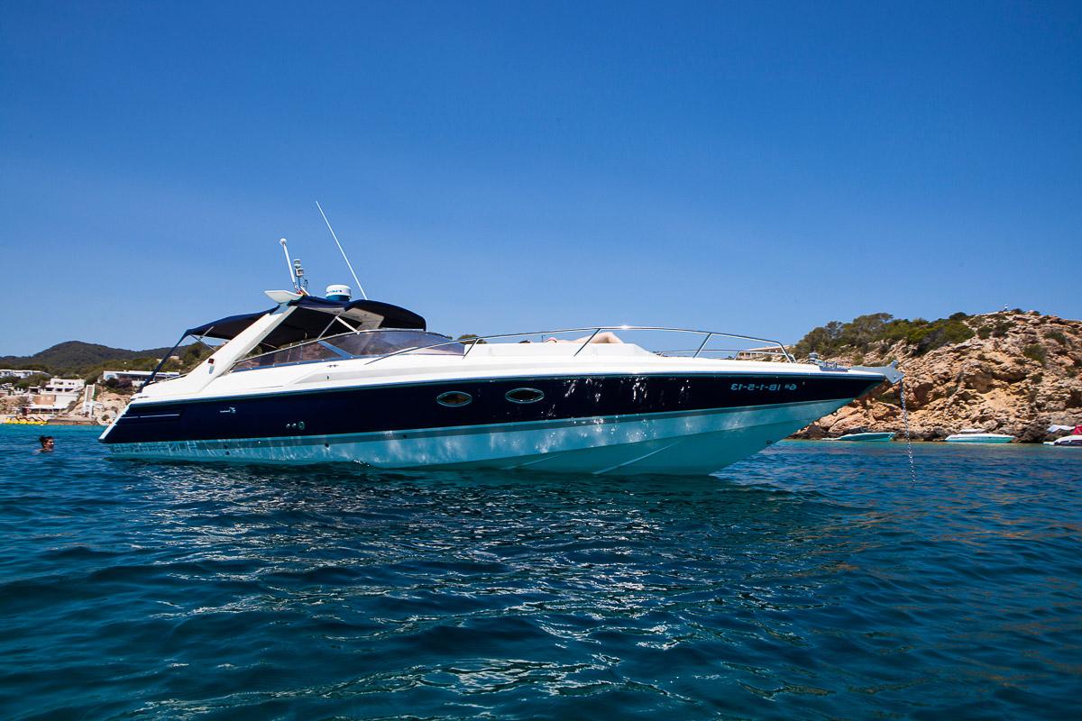 Sunseeker Tomahawk 37 1995 Sunseeker Tomahawk 37 yacht on clear blue water, coastal background.