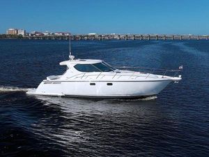 Tiara Yachts 4300 Sovran 2008 Tiara Yachts 4300 Sovran cruising on a calm blue waterway.