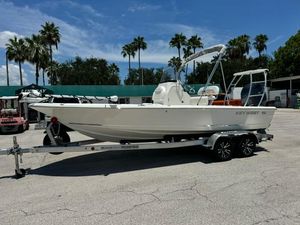 Key West 210 Bay Reef 2026 Key West 210 Bay Reef boat on trailer, parked outdoors under clear sky.