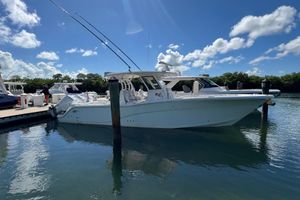 Sea Fox 368 Commander 2023 Sea Fox 368 Commander boat docked under a clear blue sky.