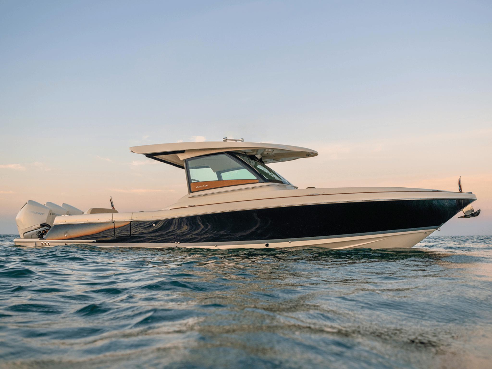 Chris-Craft Calypso 35 2026 Chris-Craft Calypso 35 boat on calm water at sunset.
