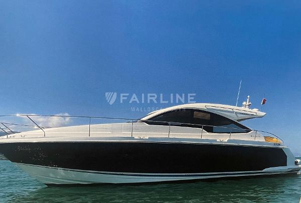 Fairline Targa 48 Open 2014 Fairline Targa 48 Open yacht on calm water under clear blue sky.
