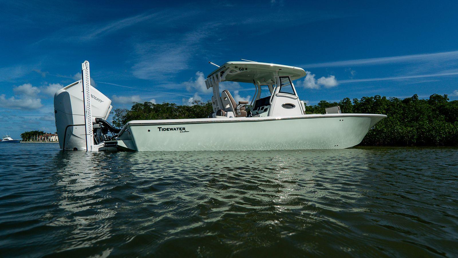 Tidewater 3100 Carolina Bay 2026 Tidewater 3100 Carolina Bay boat on calm water under blue sky.