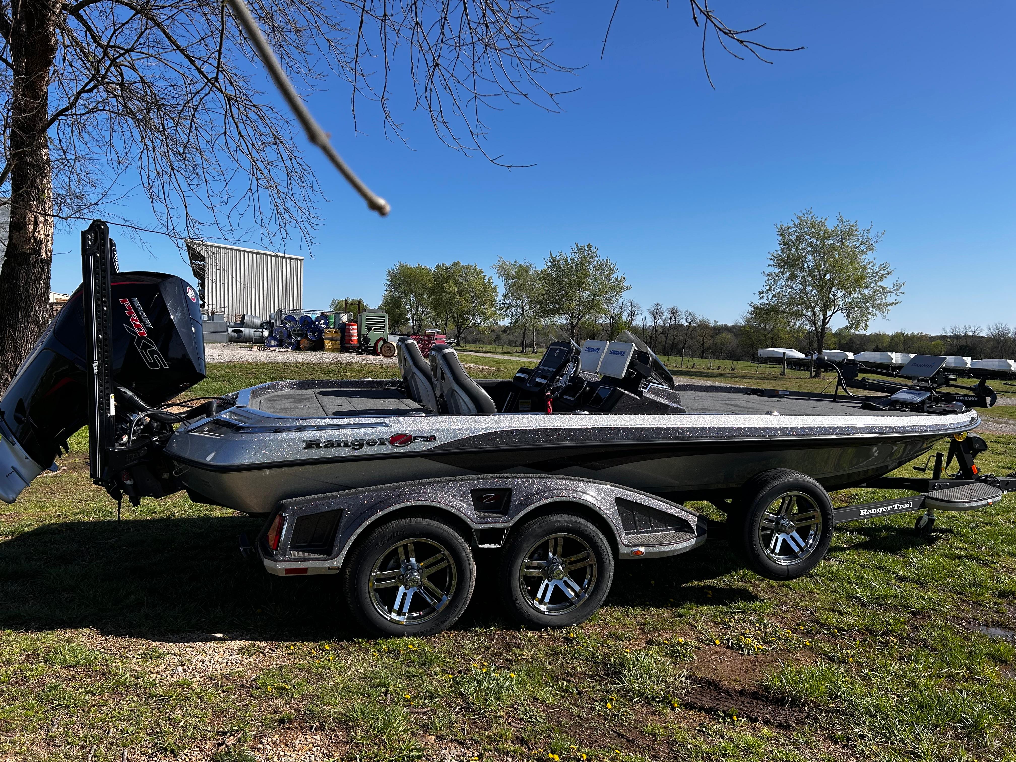 Ranger Z521R Ranger Cup Equipped 2023 Ranger Z521R Ranger Cup Equipped boat on trailer, parked outdoors.