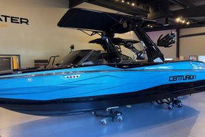 Centurion Nv243 2026 Centurion Nv243 boat in showroom, sleek blue design, modern features.