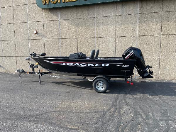 Tracker Pro Guide V-16 SC 2025 Tracker Pro Guide V-16 SC boat on trailer, parked outdoors.
