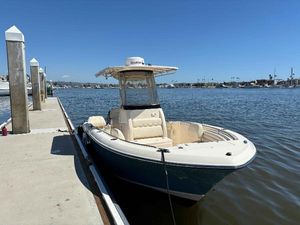 Grady-White Fisherman 216 2018 Grady-White Fisherman 216 boat docked by the marina on a sunny day.