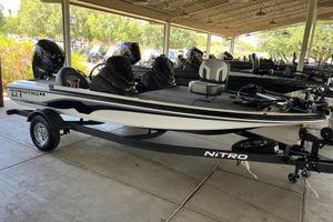 Nitro Z17 2026 Nitro Z17 boat on trailer, parked under a canopy.