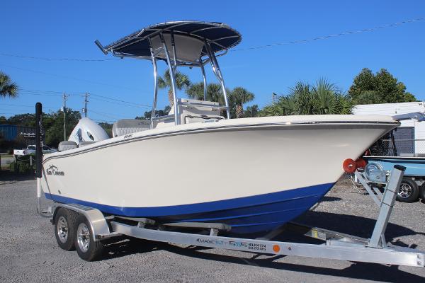 Sea Chaser 20 HFC 2023 Sea Chaser 20 HFC boat on trailer, featuring sleek design and blue hull.