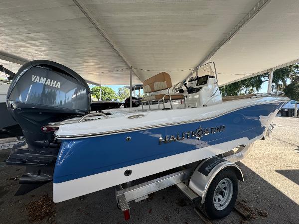 NauticStar 191 Hybrid 2024 NauticStar 191 Hybrid boat with Yamaha engine on trailer.