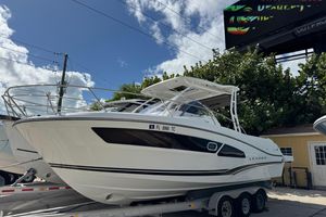 Jeanneau Leader 9.0 WA 2021 Jeanneau Leader 9.0 WA boat on trailer under clear sky.