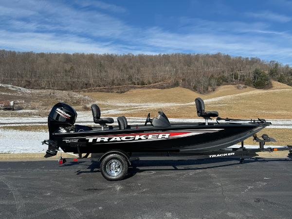Tracker Pro Team 175 Crappie Edition 2025 Tracker Pro Team 175 Crappie Edition boat on trailer, outdoors, clear sky.
