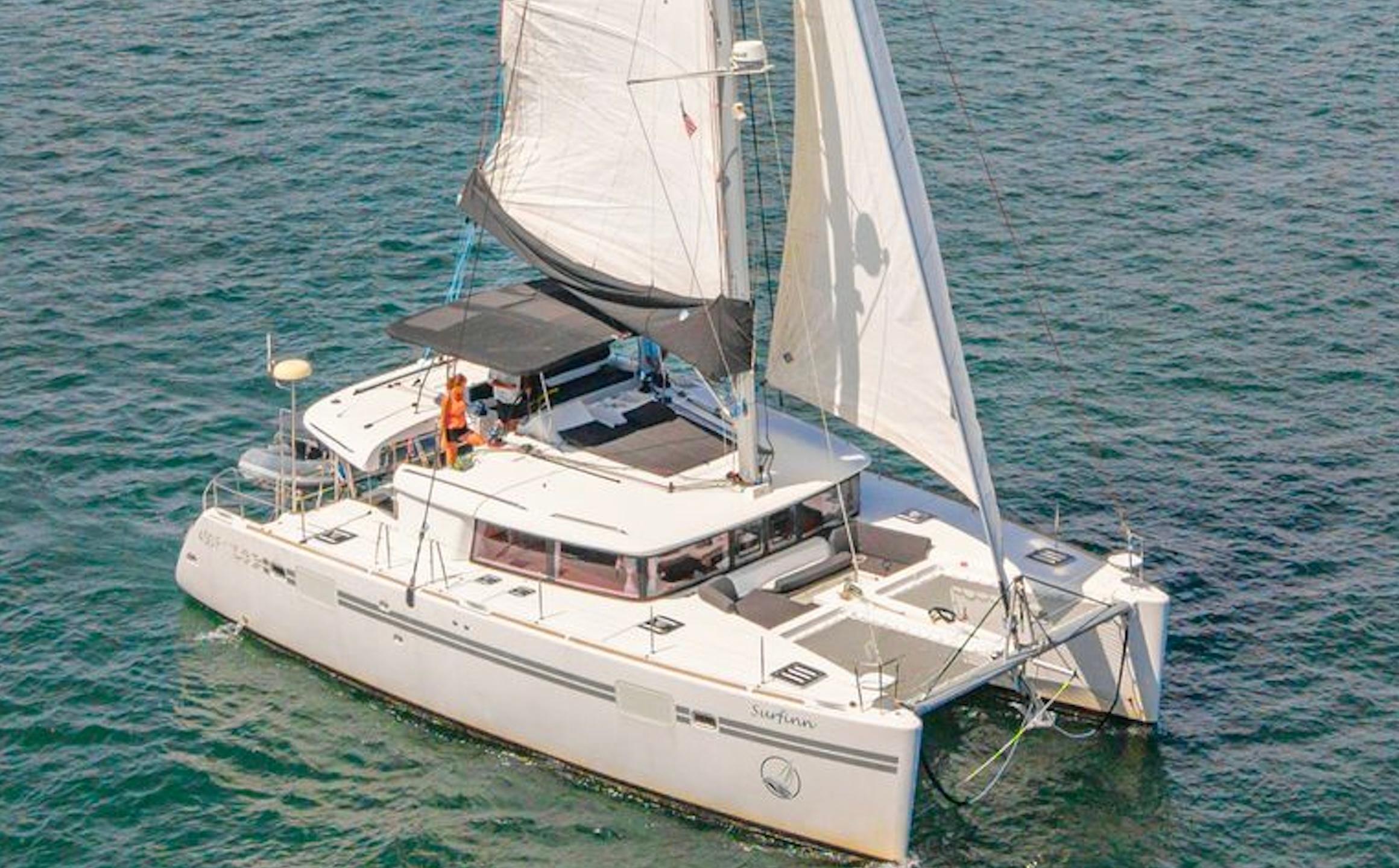 Lagoon 450 F 2017 Lagoon 450 F catamaran sailing on open water with full sails.