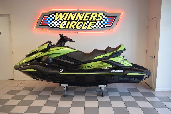 Yamaha WaveRunner FX Cruiser SVHO 2024 Yamaha WaveRunner FX Cruiser SVHO in showroom with "Winners Circle" sign.