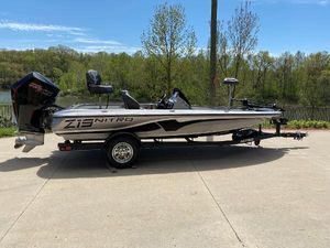 Nitro Z19 2024 Nitro Z19 fishing boat on trailer, side view, outdoors.