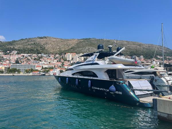 Dominator 860 Luxury yacht Dominator 860, 2007 model, docked in scenic coastal marina.