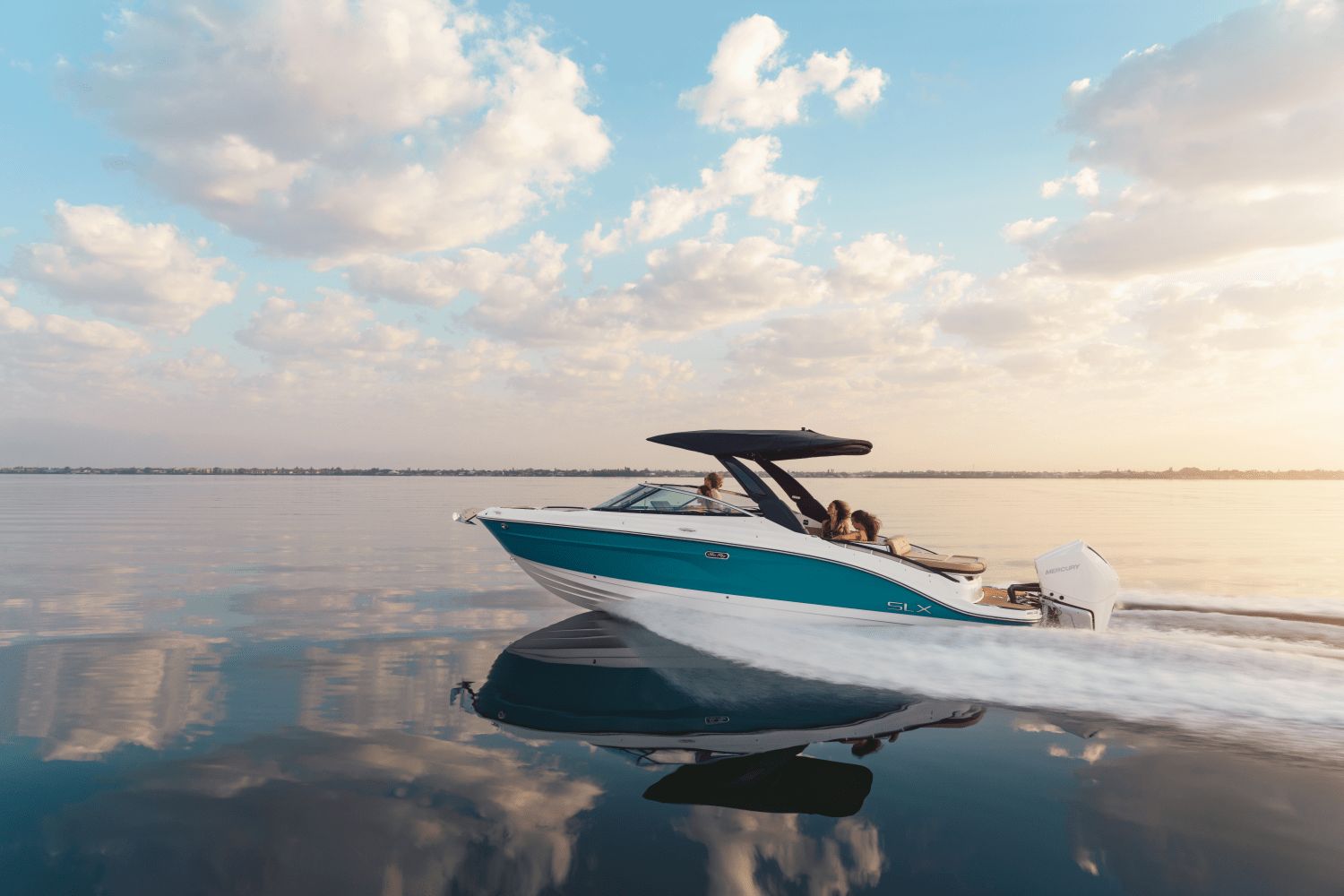 Sea Ray SLX 280 Outboard 2026 Sea Ray SLX 280 Outboard cruising on calm water at sunset.