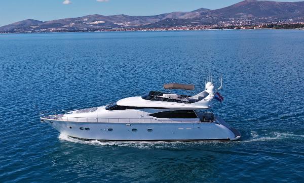 Maiora 20S Luxury 2008 Maiora 20S yacht cruising on a serene blue sea.