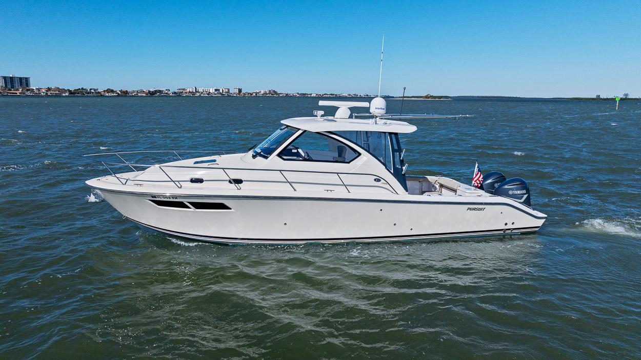 Pursuit OS 355 Offshore 2018 Pursuit OS 355 Offshore boat cruising on open water.