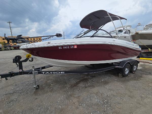Tahoe 500 TF 2019 Tahoe 500 TF boat on trailer, red and white, parked outdoors.