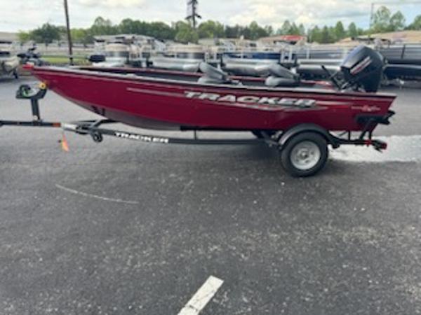Tracker Super Guide V-16 T 2025 Tracker Super Guide V-16 T boat on trailer, parked outdoors.