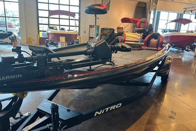 Nitro Z21 XL Pro 2026 Nitro Z21 XL Pro boat displayed in showroom with Garmin equipment.