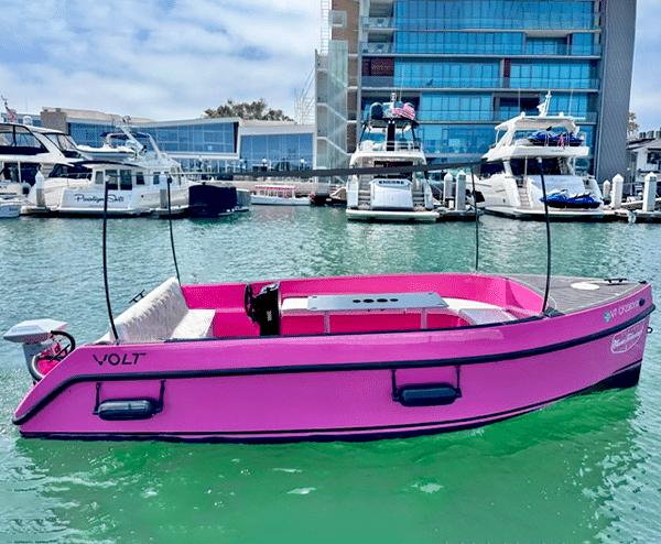 Vision Marine Technologies Volt 180 2023 Vision Marine Technologies Volt 180, pink electric boat docked in marina.