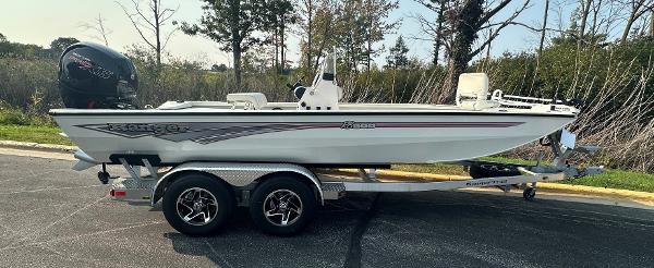 Ranger RB200 2024 Ranger RB200 boat on trailer, parked outdoors.