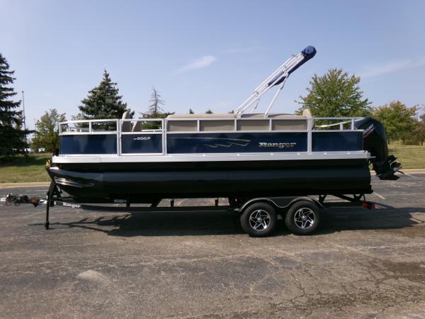 Ranger Reata 200F 2024 Ranger Reata 200F pontoon boat on trailer, parked outdoors.