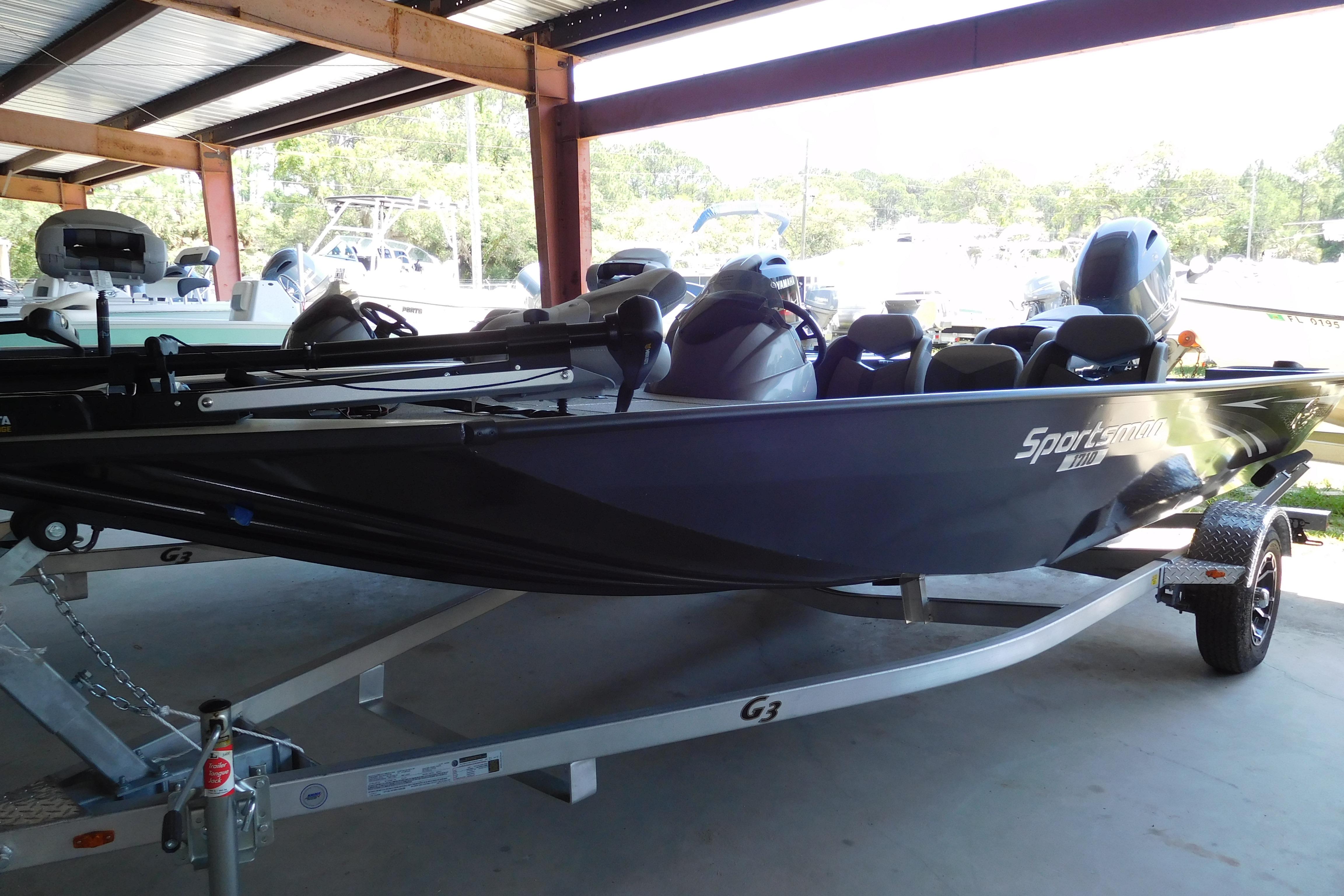 G3 Sportsman 17 PFX 2024 G3 Sportsman 17 PFX boat on trailer in covered storage area.