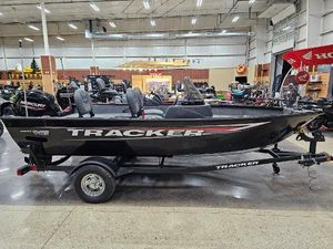 Tracker Pro Guide V-16 SC 2025 Tracker Pro Guide V-16 SC boat displayed indoors on a trailer.