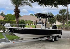 Sportsman Masters 227 Bay Boat 2017 Sportsman Masters 227 Bay Boat on trailer, parked in a residential driveway.