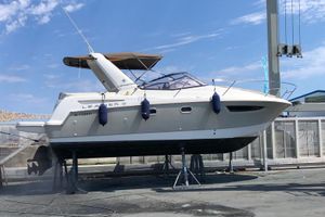 Jeanneau Leader 8 2016 Jeanneau Leader 8 boat on stands, undergoing maintenance at a marina.