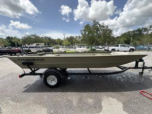 Tracker Grizzly 1754 Jon 2025 Tracker Grizzly 1754 Jon boat on trailer under cloudy sky.