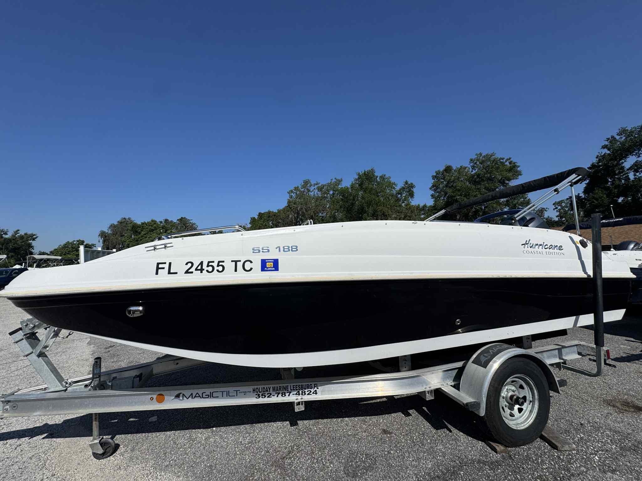 Hurricane SunDeck Sport 188 OB 2022 Hurricane SunDeck Sport 188 OB boat on trailer, parked outdoors.