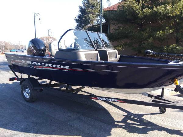Tracker Pro Guide V-175 Combo 2025 Tracker Pro Guide V-175 Combo boat on trailer, parked outdoors.