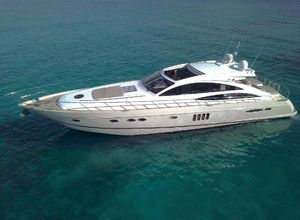 Princess V70 Luxury 2006 Princess V70 yacht cruising on clear blue waters.