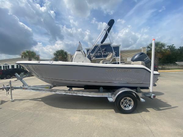 Key West 189 FS 2024 Key West 189 FS boat on trailer at dealership, side view.